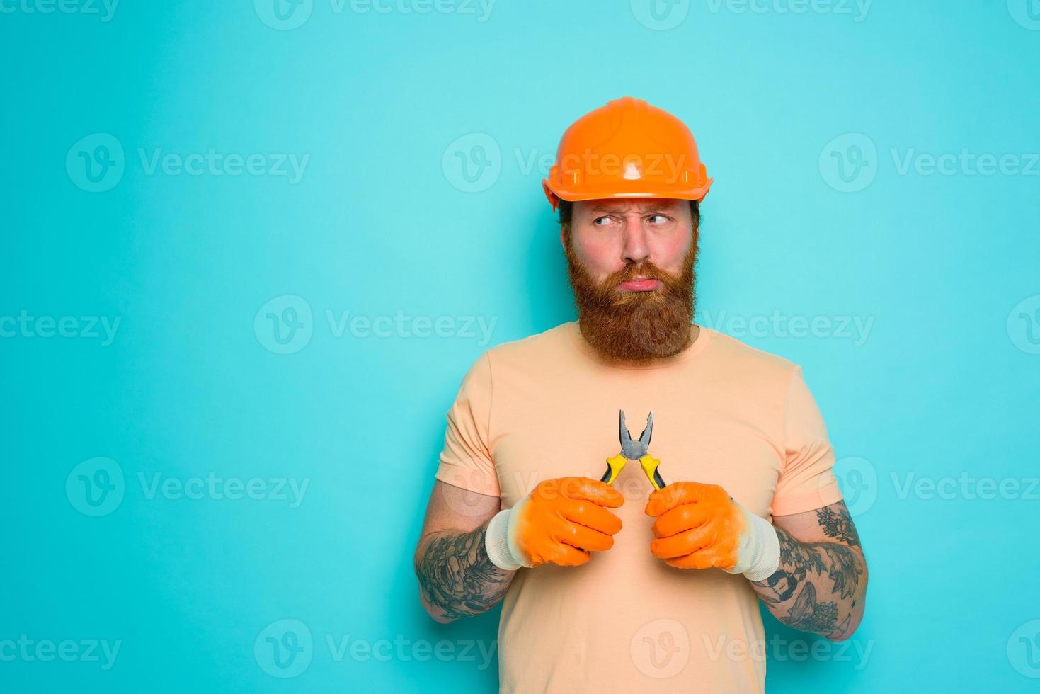 Incompetent worker is unsure and confused about his work photo