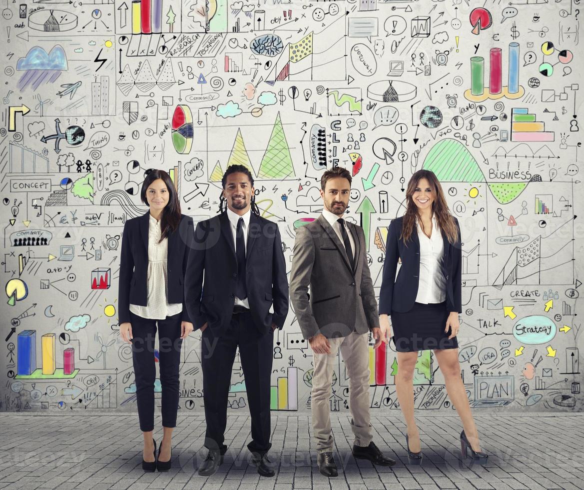 Group of successful men and women business people work on a creative project. Team and corporate concept photo