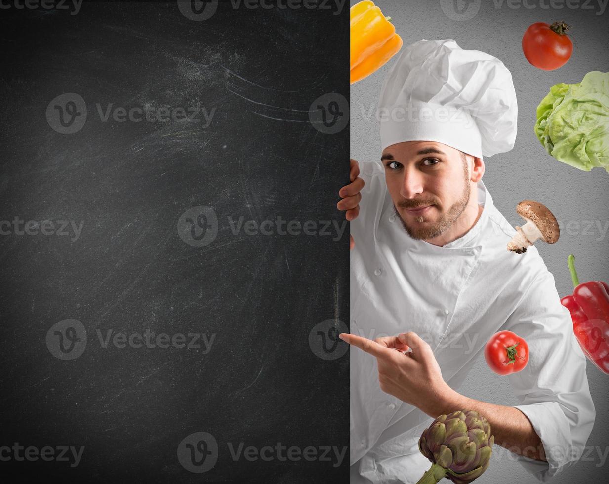 Chef with blackboard photo