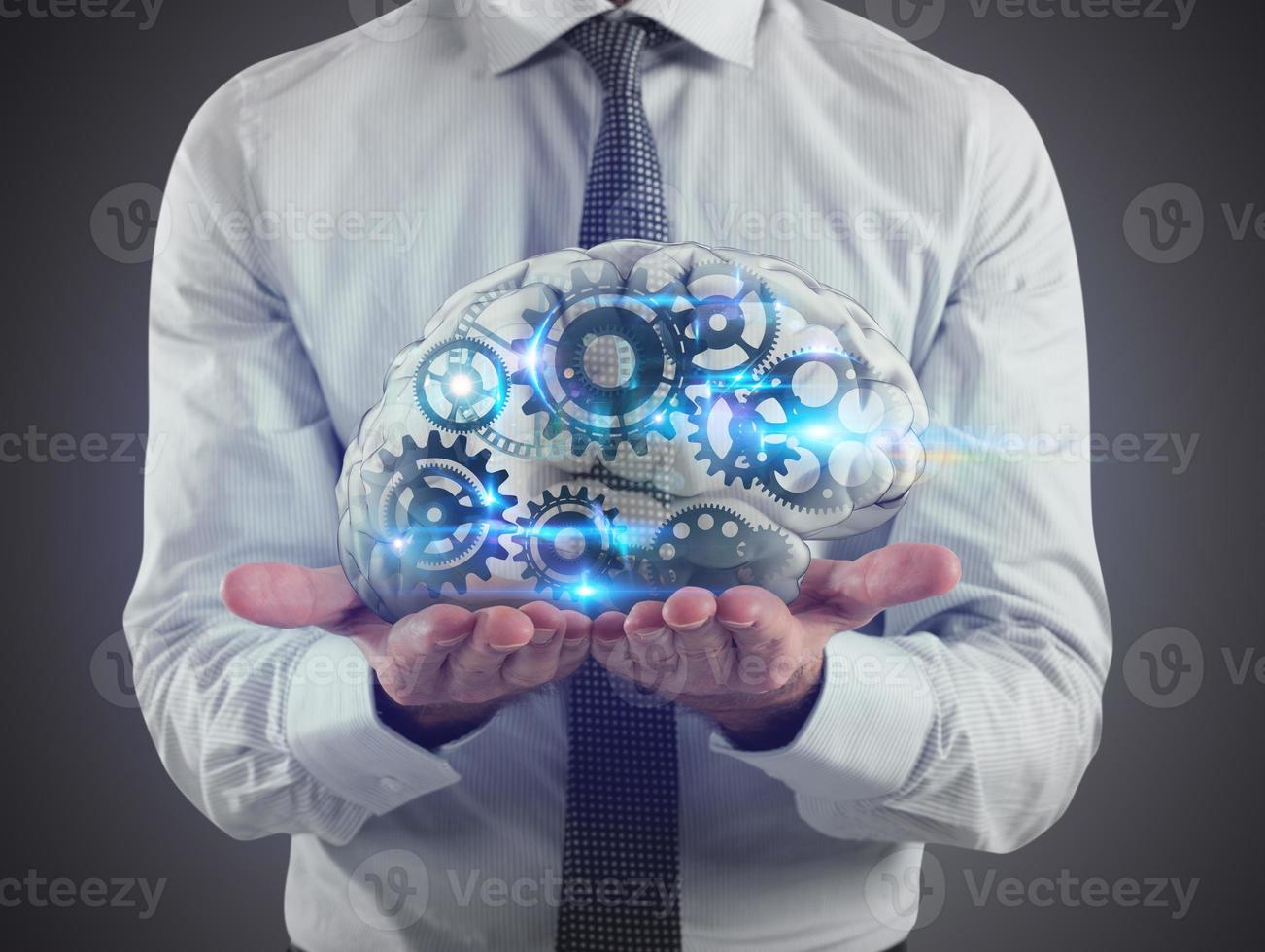 Man holds a brain with gears inside on his hands. 3D Rendering photo