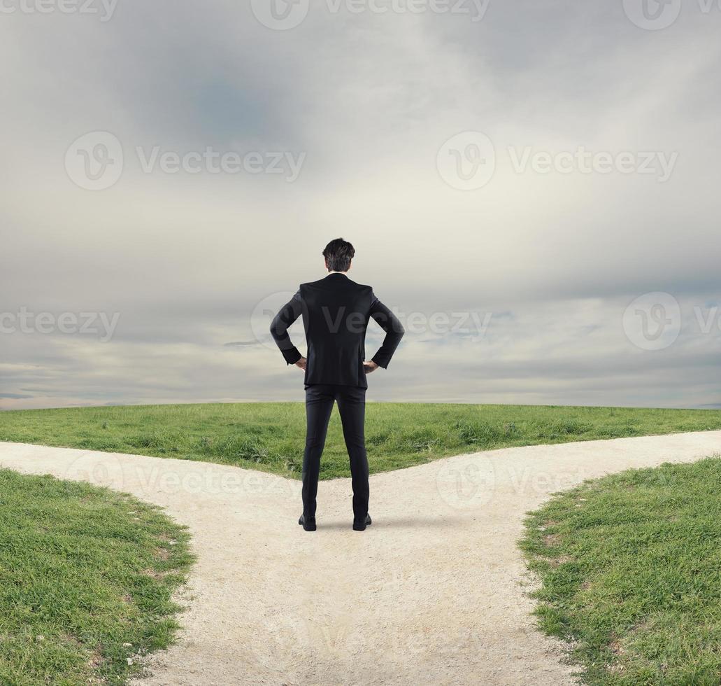 Choices of a businessman at a crossroads. Concept of decision photo