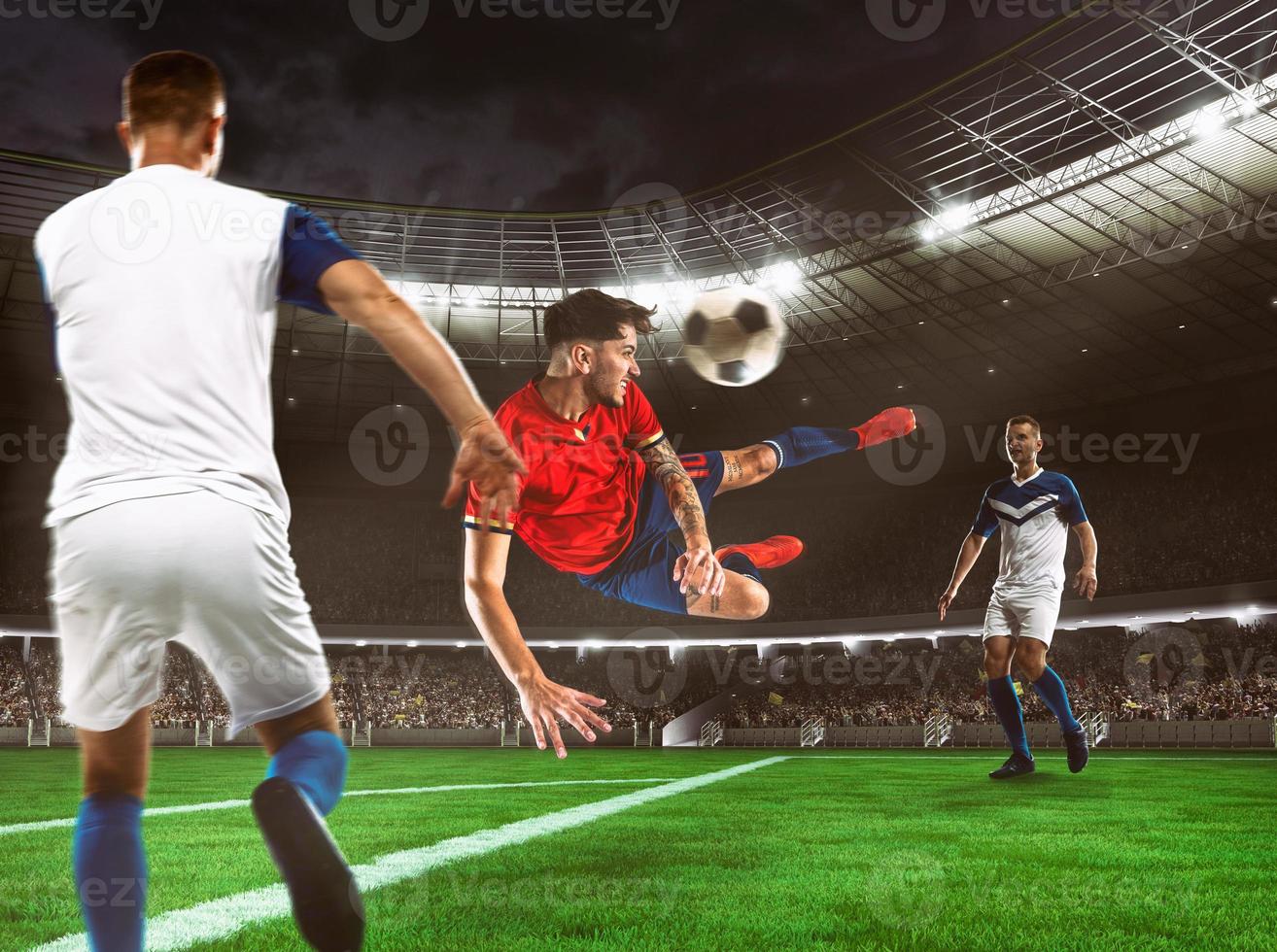 Soccer striker in red and blue uniform hits the ball with an head shot in the air at the stadium photo