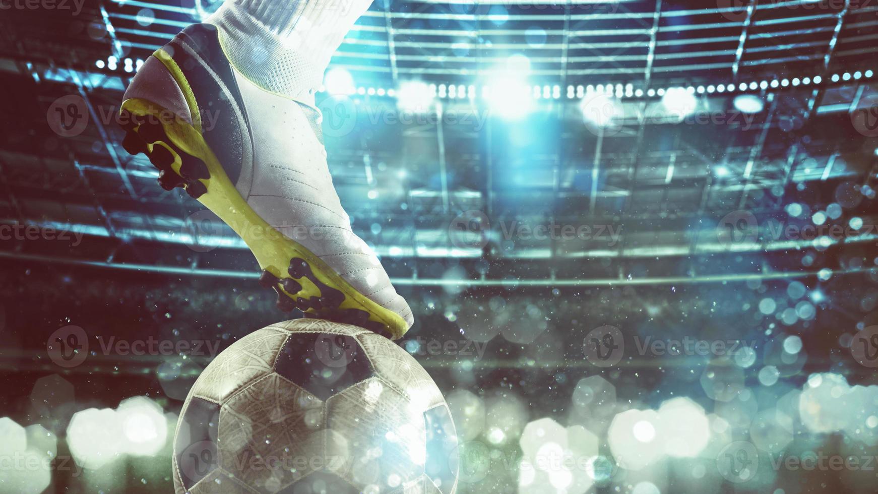 Close up of a soccer striker ready to kicks the ball at the stadium photo