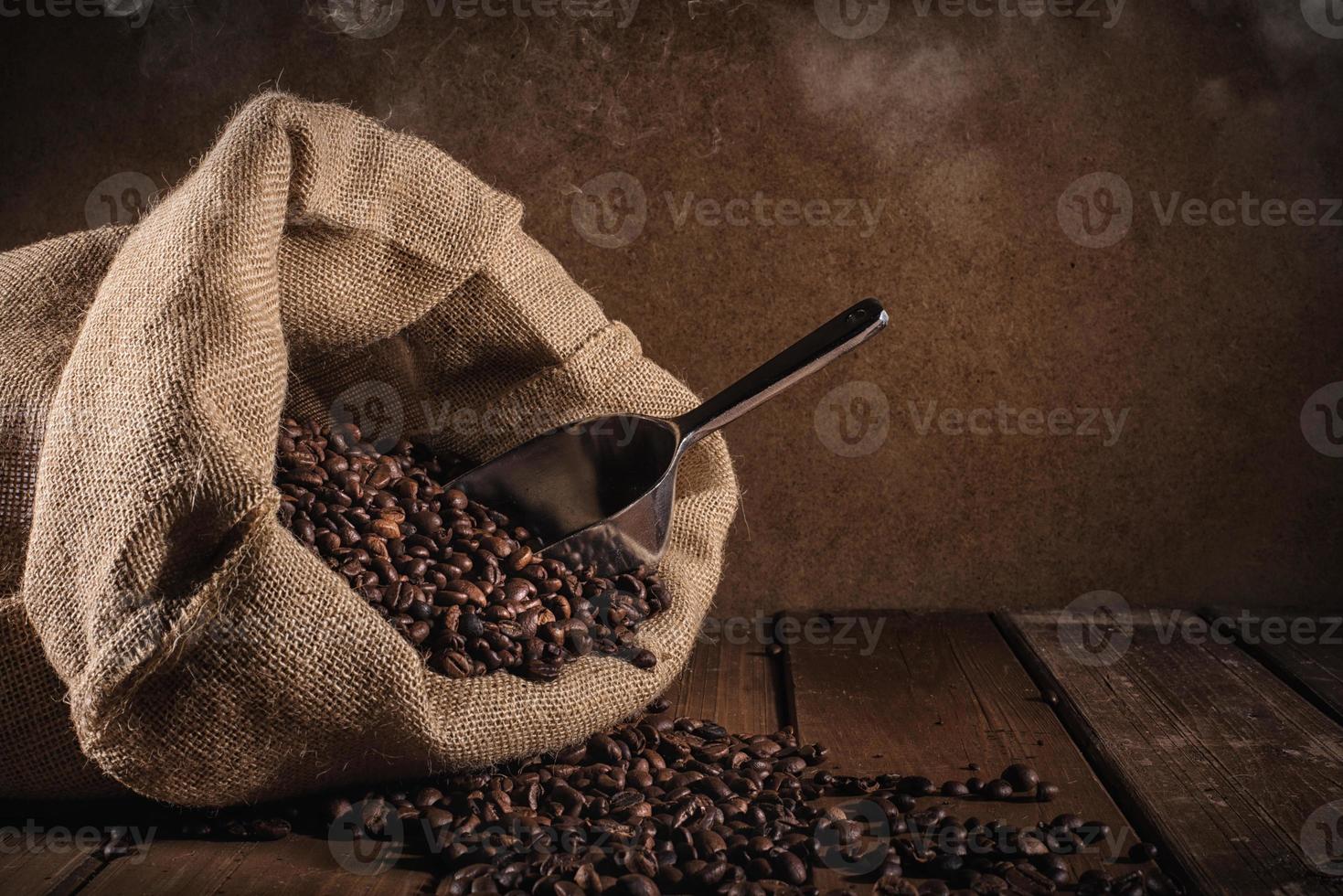 Coffee beans on grunge background photo