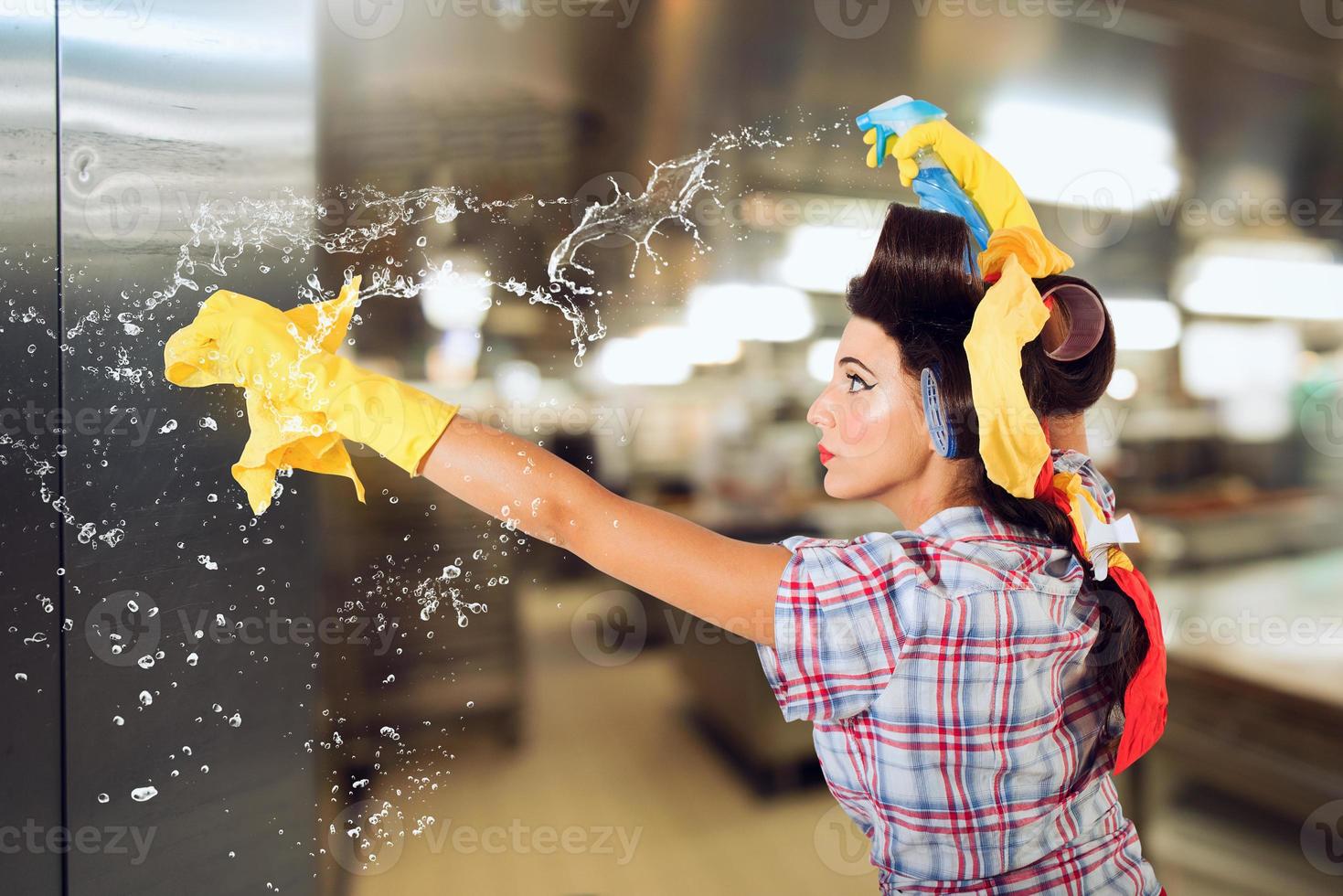 Funny housewife cleans and disinfects to keep germs away photo