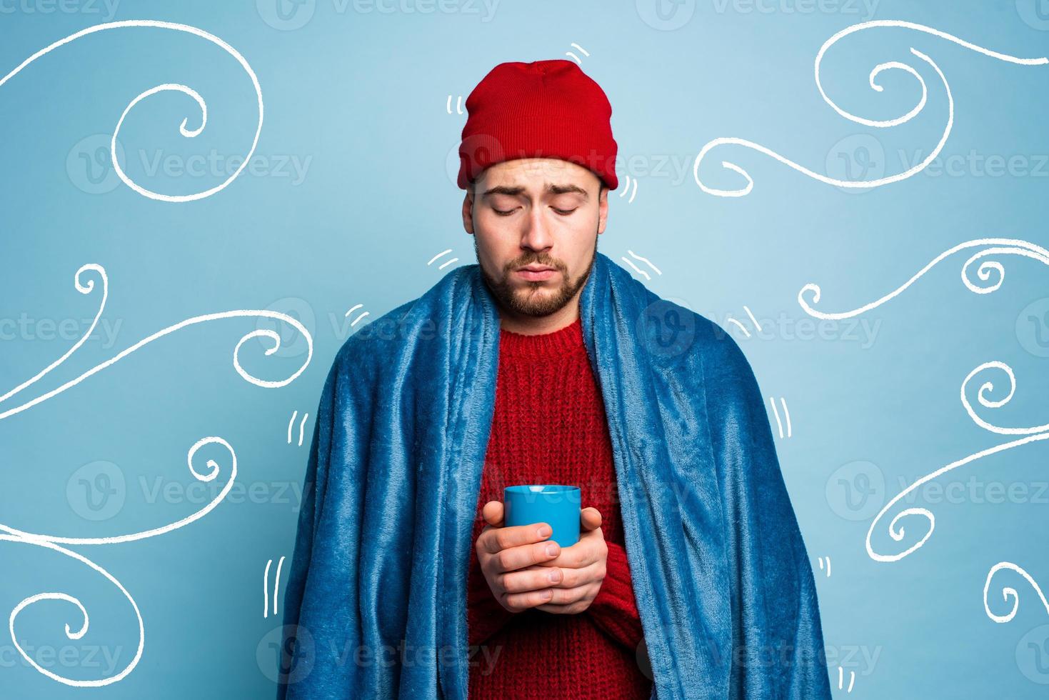 Boy caught a cold and drinks hot the. Cyan background. Concept of