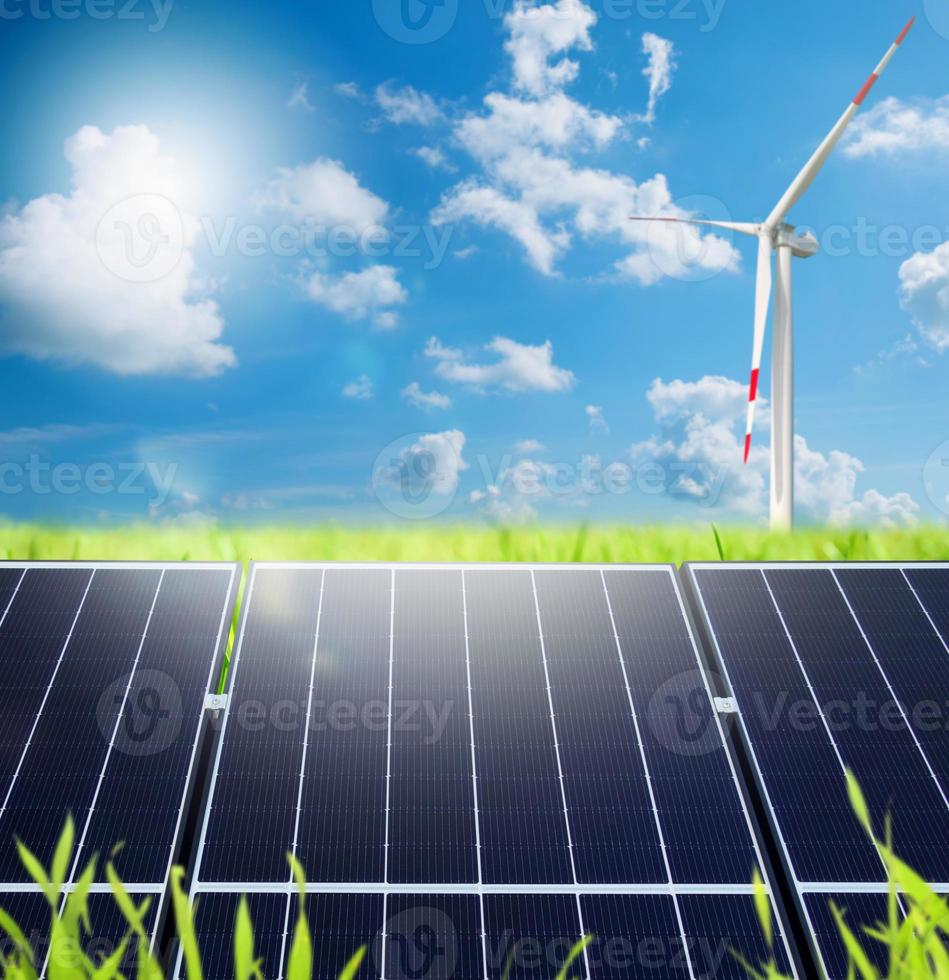 Renewable energy system with solar panel and wind turbine photo