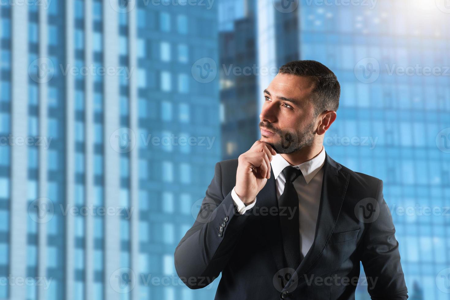 Businessman thinks new strategies to grow up the company photo