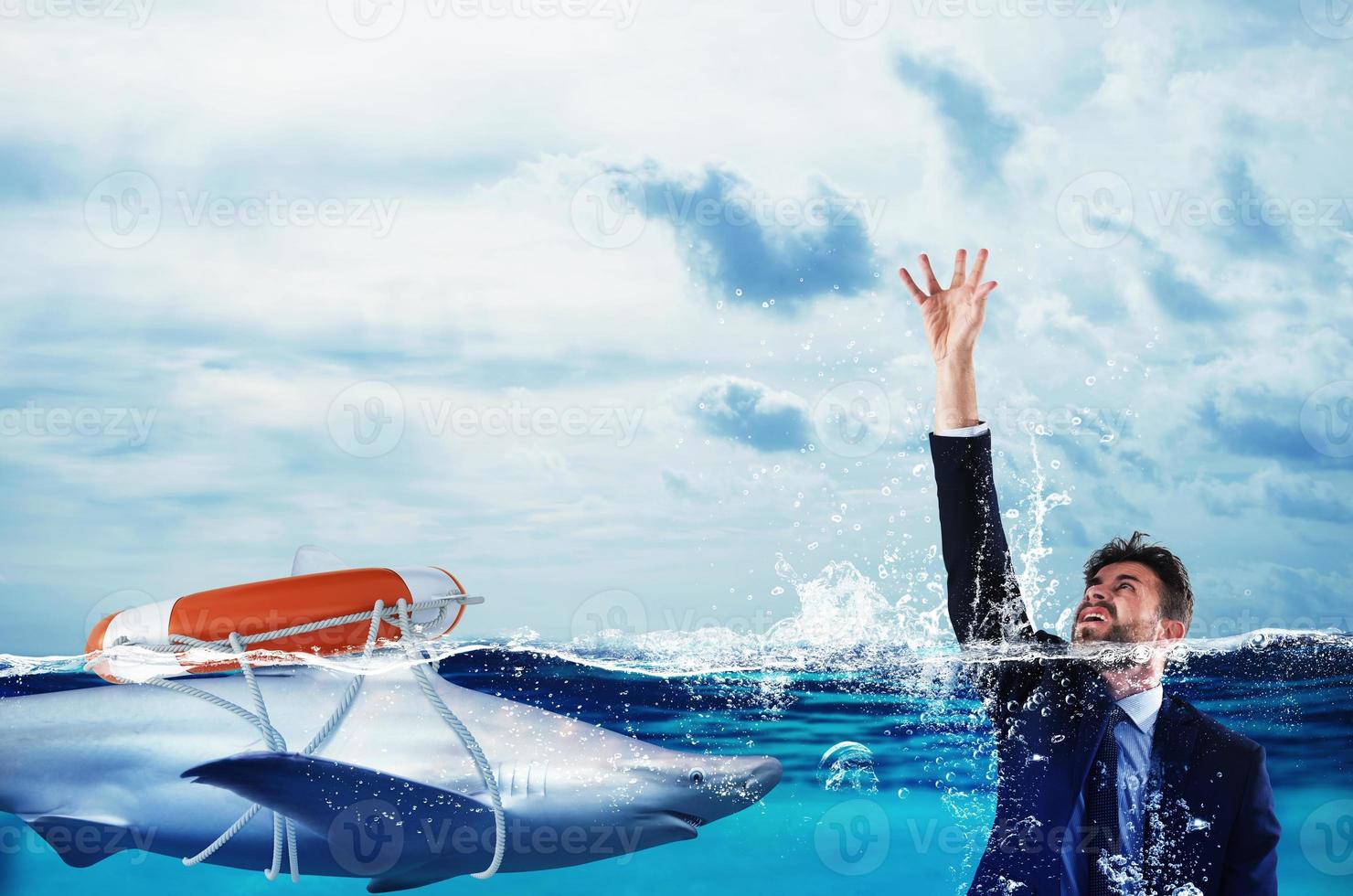 Businessman is likely to drown. Help with deception concept photo