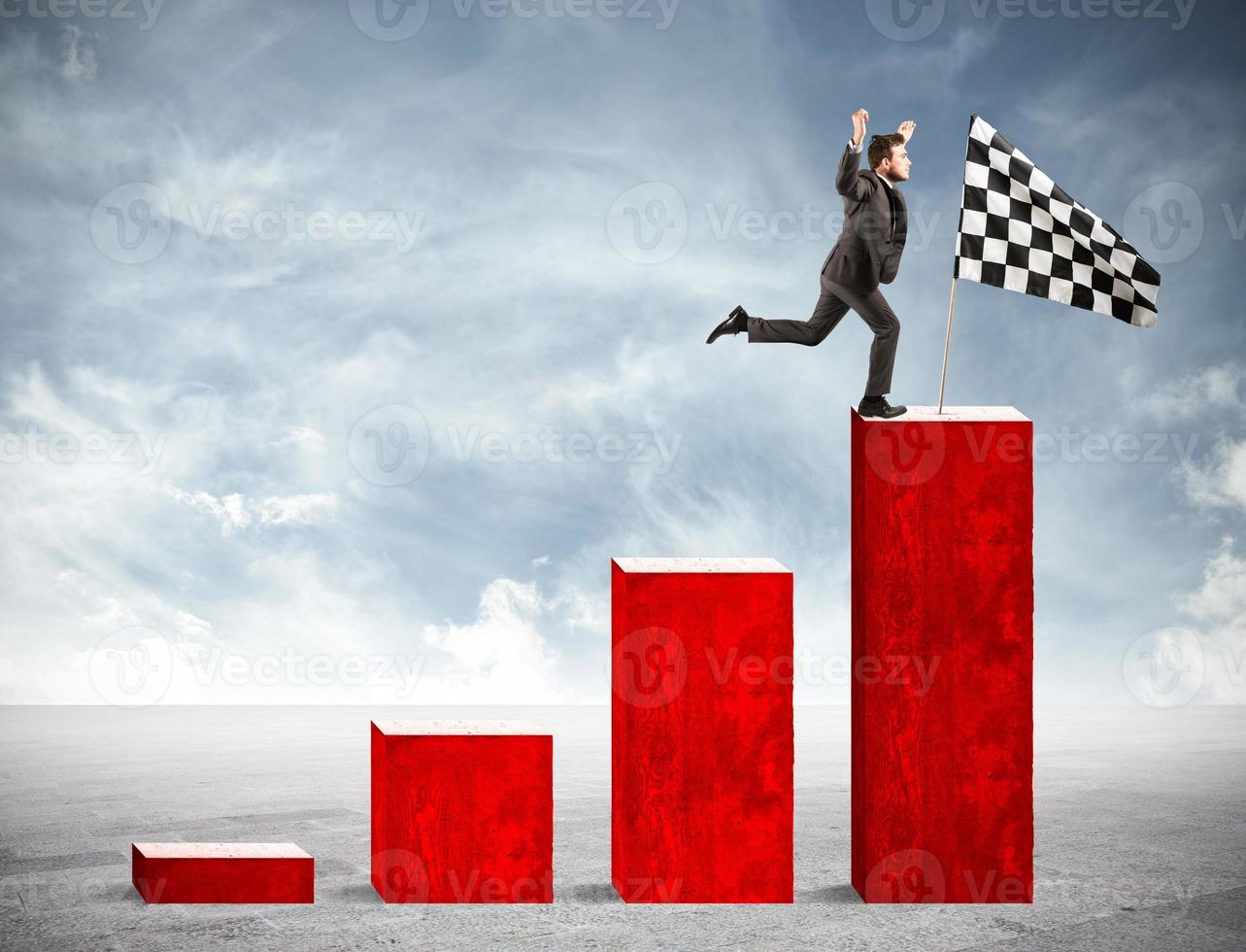 Businessman reaches glory on a statistical scale photo