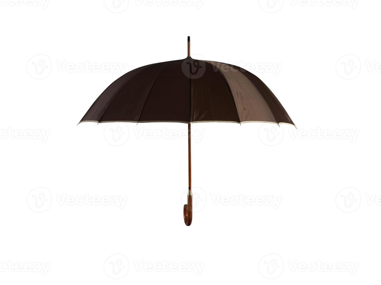 Brown open umbrella. concept of help and insurance photo