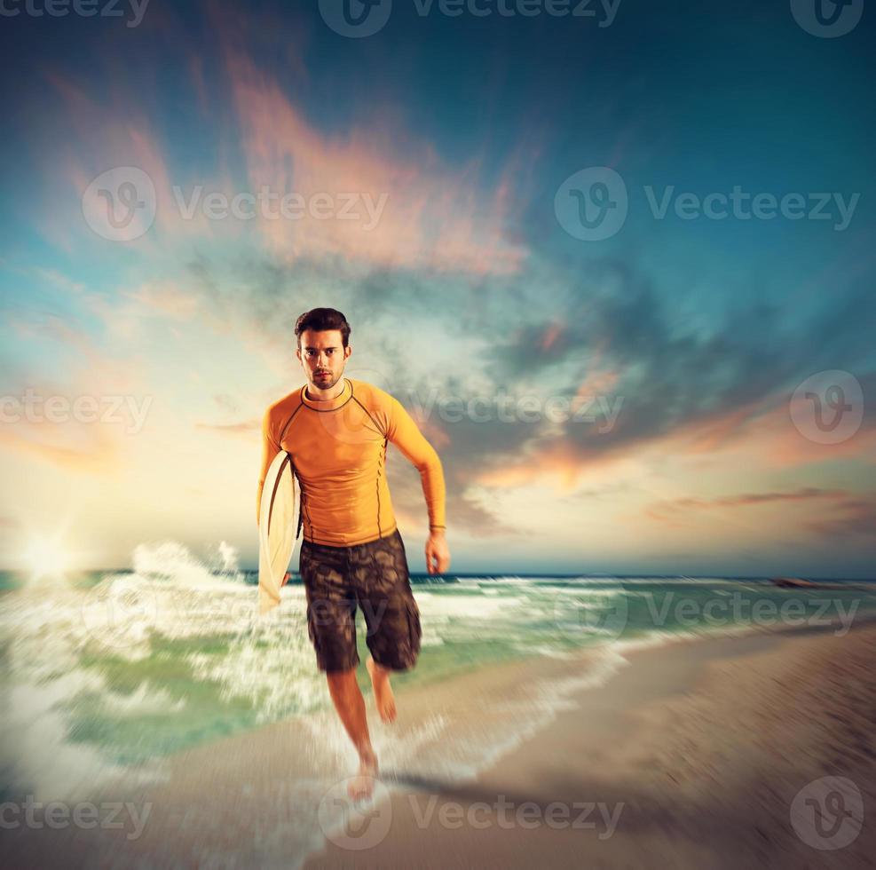 Surfer on the beach photo