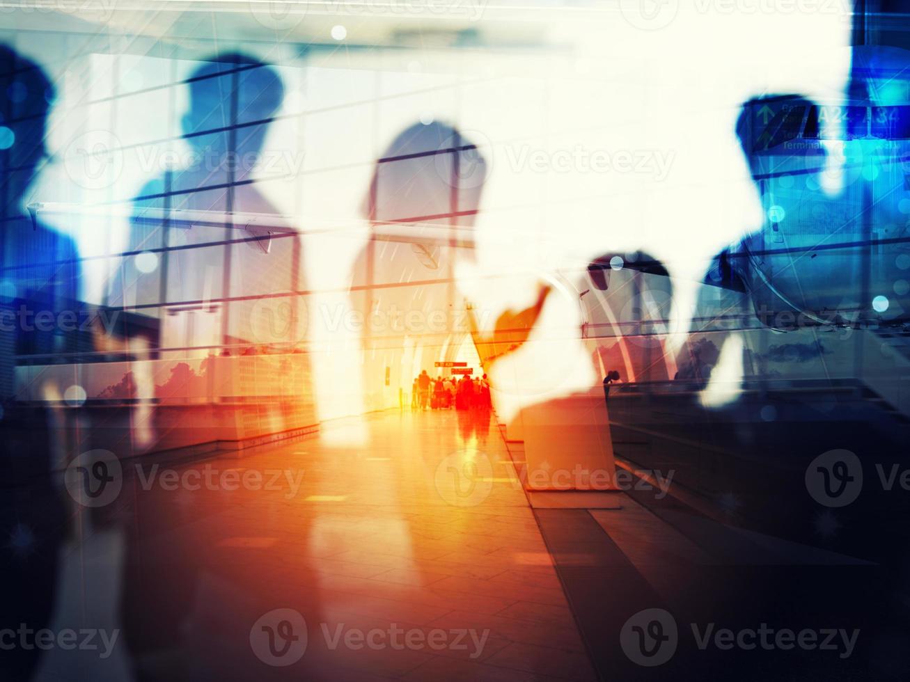 Take off of a modern aircraft and double exposure with silhouettes of passengers in the airport photo