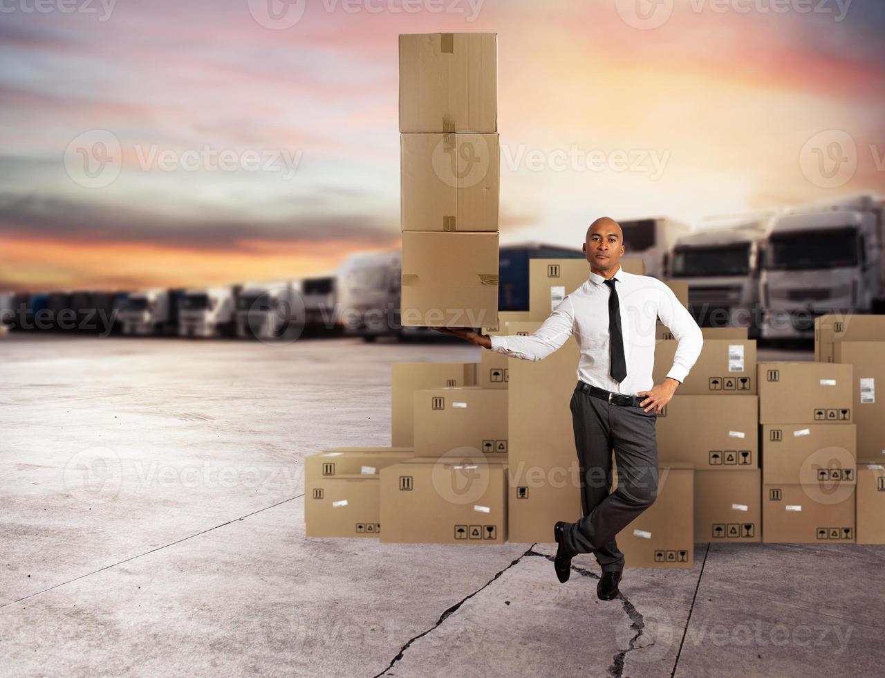 Businessman holds a pile of packages in a hand. concept of fast delivery photo