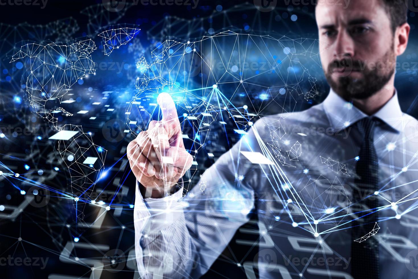 Man connecting to global world. Concept of interconnection, internet and network photo