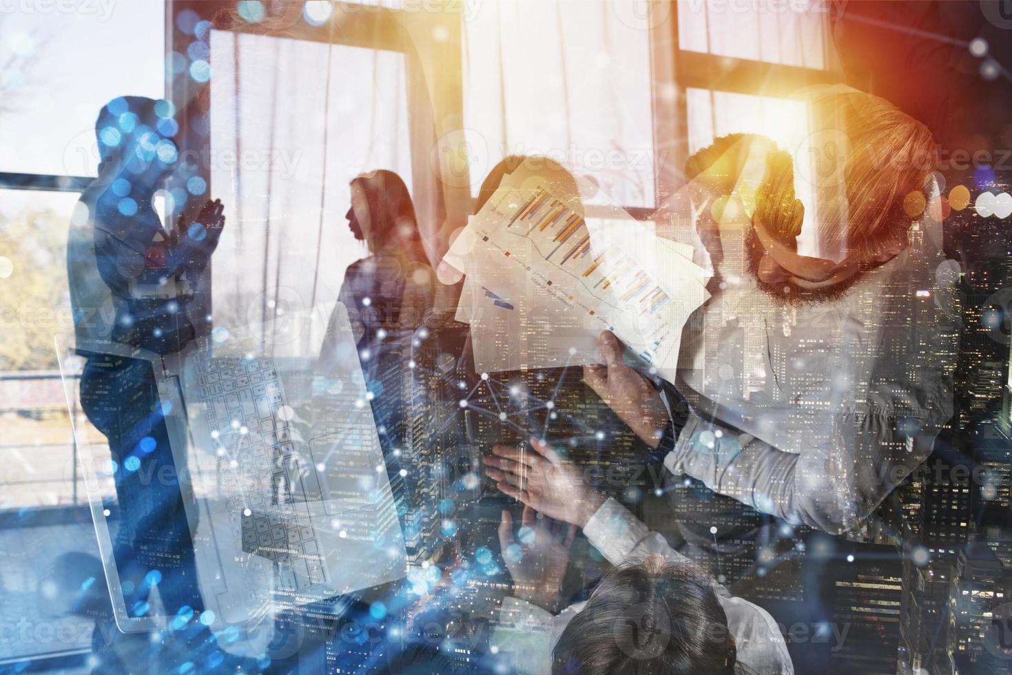 Team of people work together in office. Concept of teamwork and partnership. Double exposure. photo