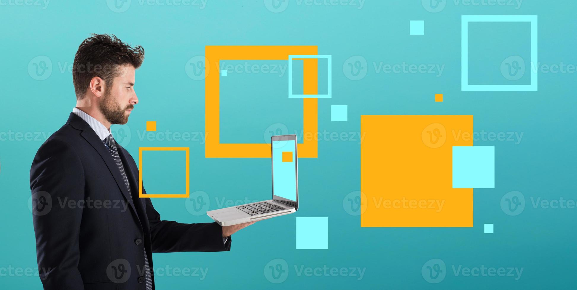 Businessman works with his laptop and shared data via internet. Isolated on white background photo