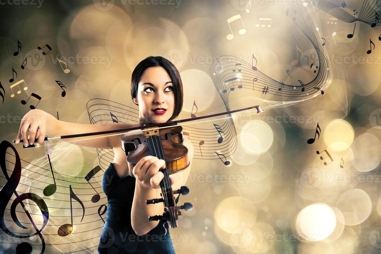 Charming violinist player photo