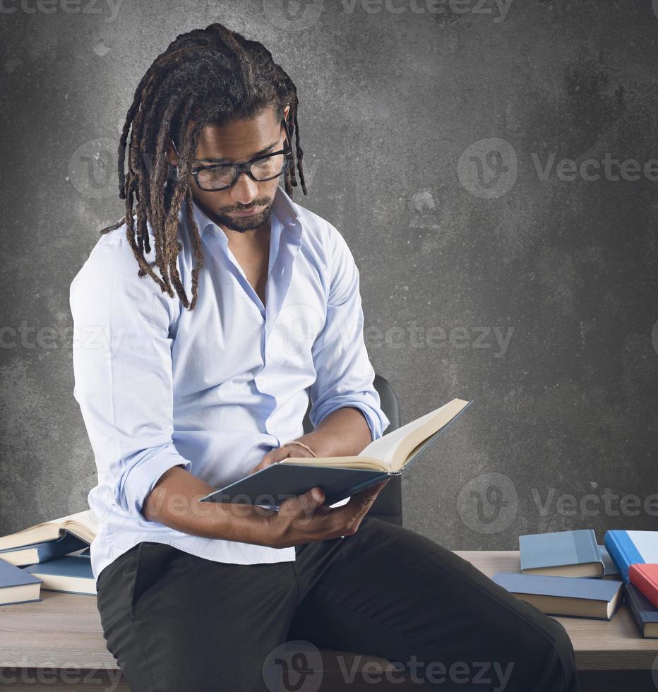 Teacher reads the interesting books before class photo