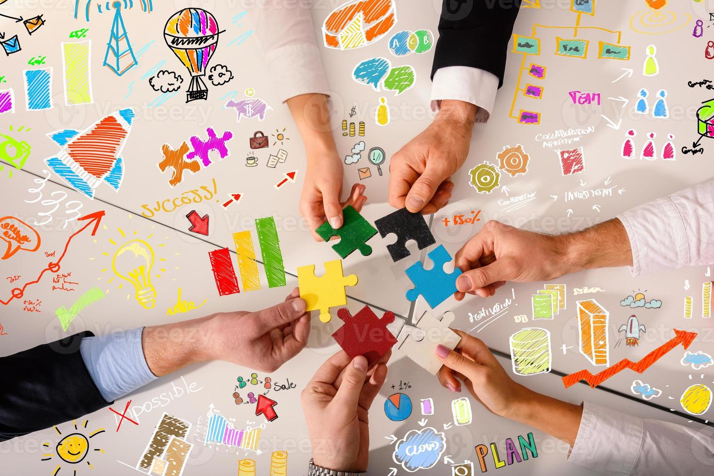 Teamwork of partners connect puzzle pieces as integration and startup photo