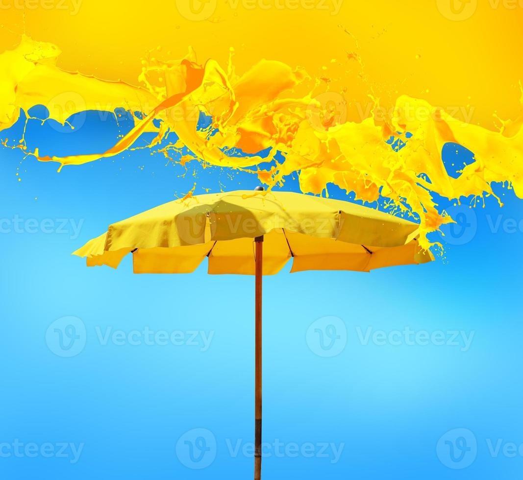 Cool fresh background for summer with yellow umbrella photo