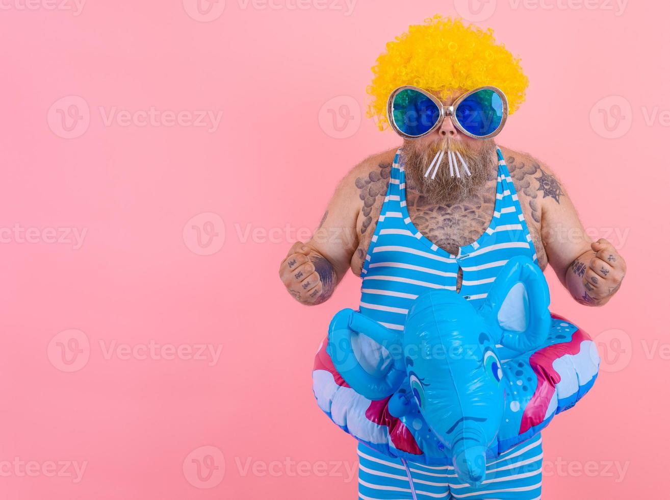 Fat serious man with beard and wig smokes cigarettes photo