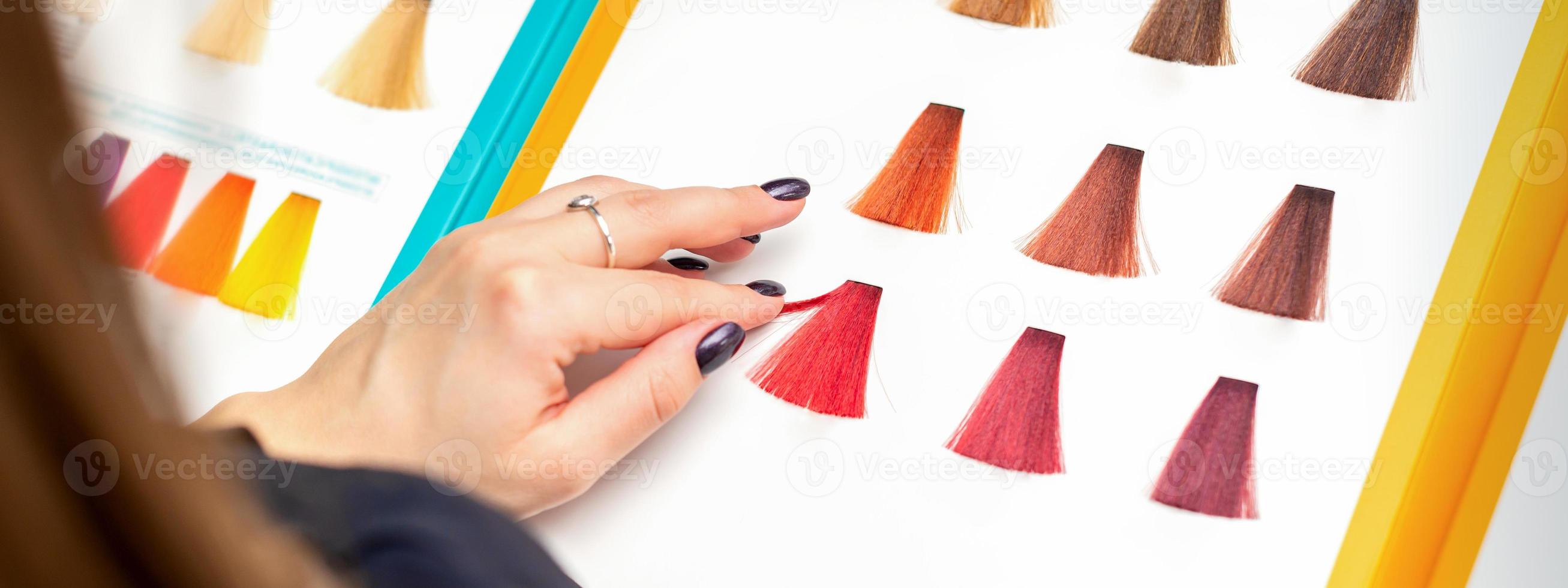 Choosing pink or red colour for hair colouring photo