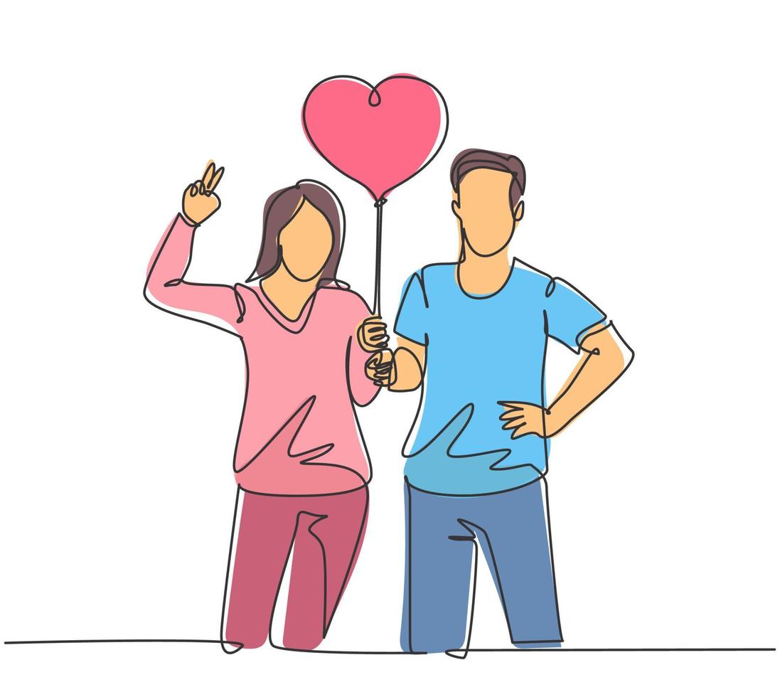 un dibujo de una sola línea de un joven feliz pareja de hombre y mujer dando un paseo en el parque público juntos y sosteniendo un globo en forma de corazón. concepto de aniversario de matrimonio ilustración de diseño de dibujo de línea continua vector