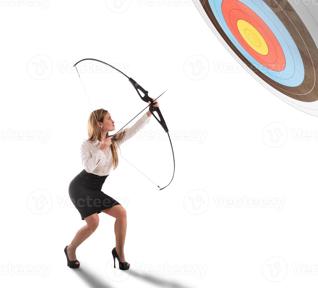 Businesswoman point to success in business with arrow photo