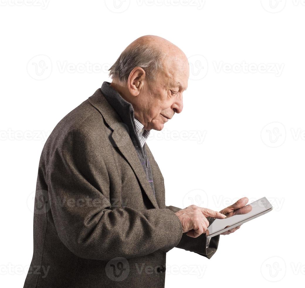 Old man surfing internet photo