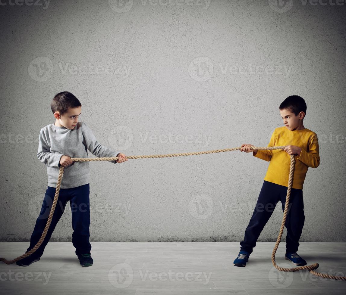 Rivalry of two brothers with a rope photo