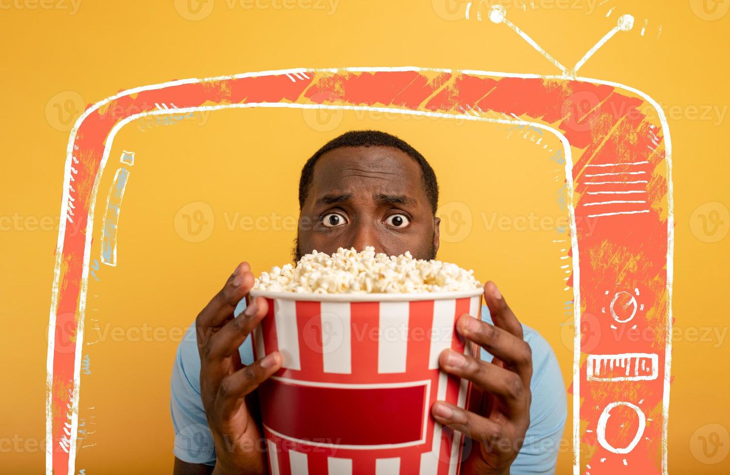 Worried boy watches a horror film. concept of entertainment and streaming tv. background photo