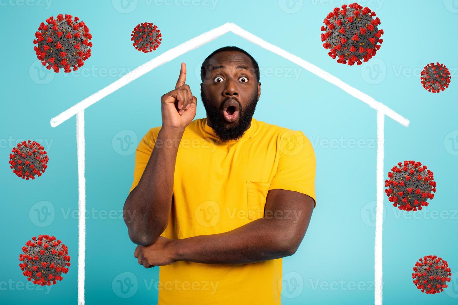 Concept of stay at home message with a man inside his house and around outside covid 19 coronavirus photo