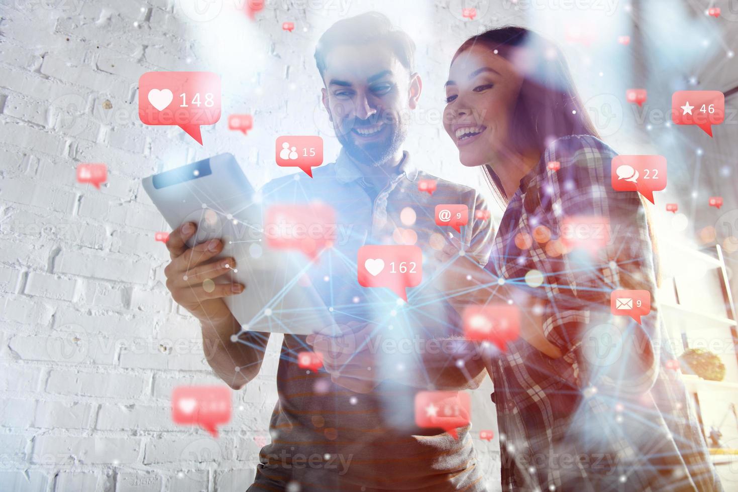Business people works in office with a tablet with social network. Concept of internet sharing photo