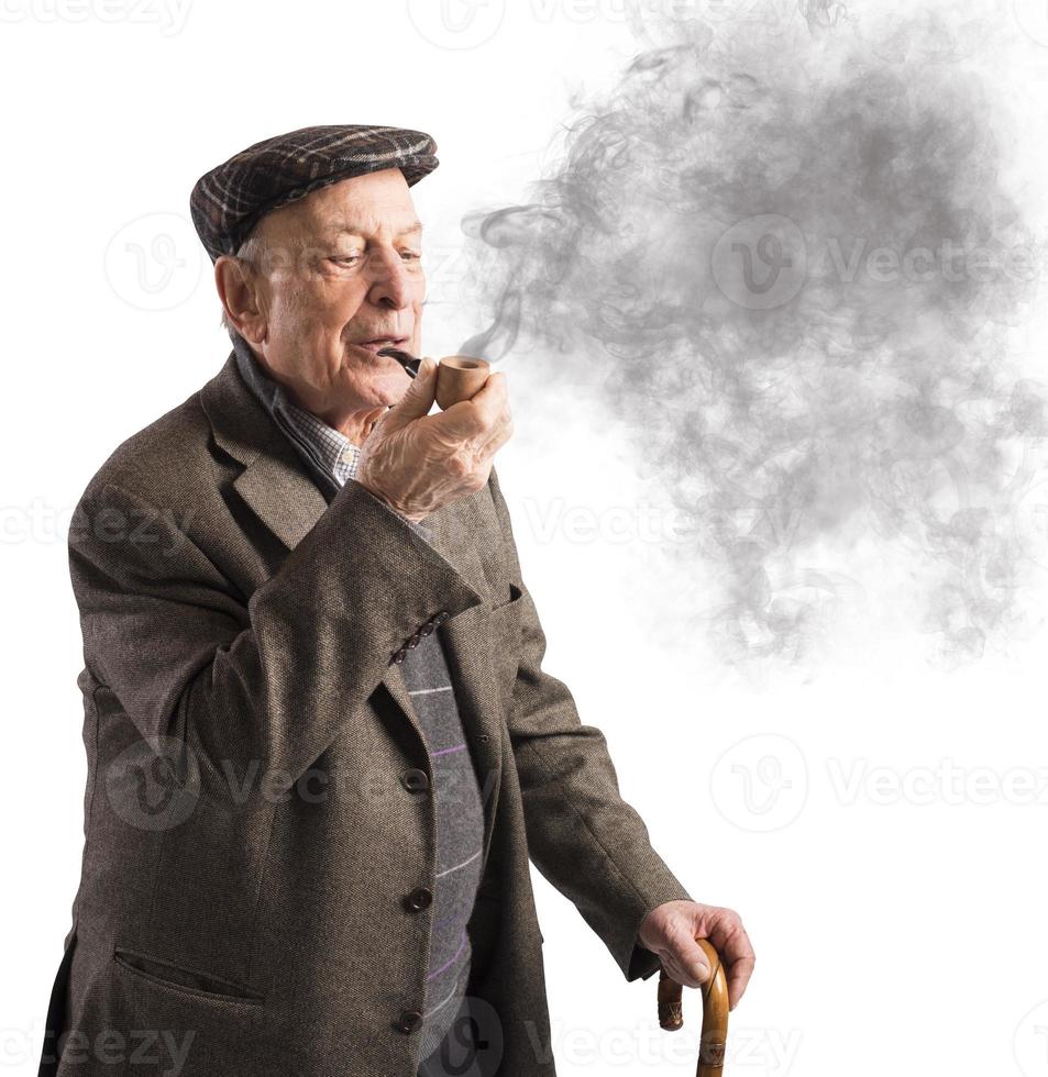 Old man smoking pipe photo