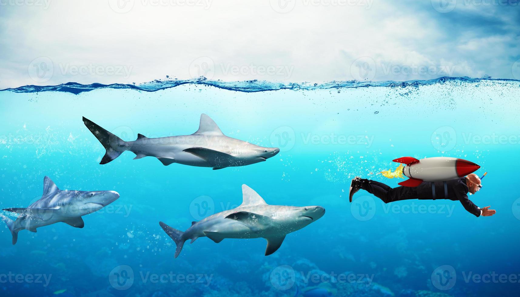 Concept of competition. Businessman escapes from sharks with a rocket photo