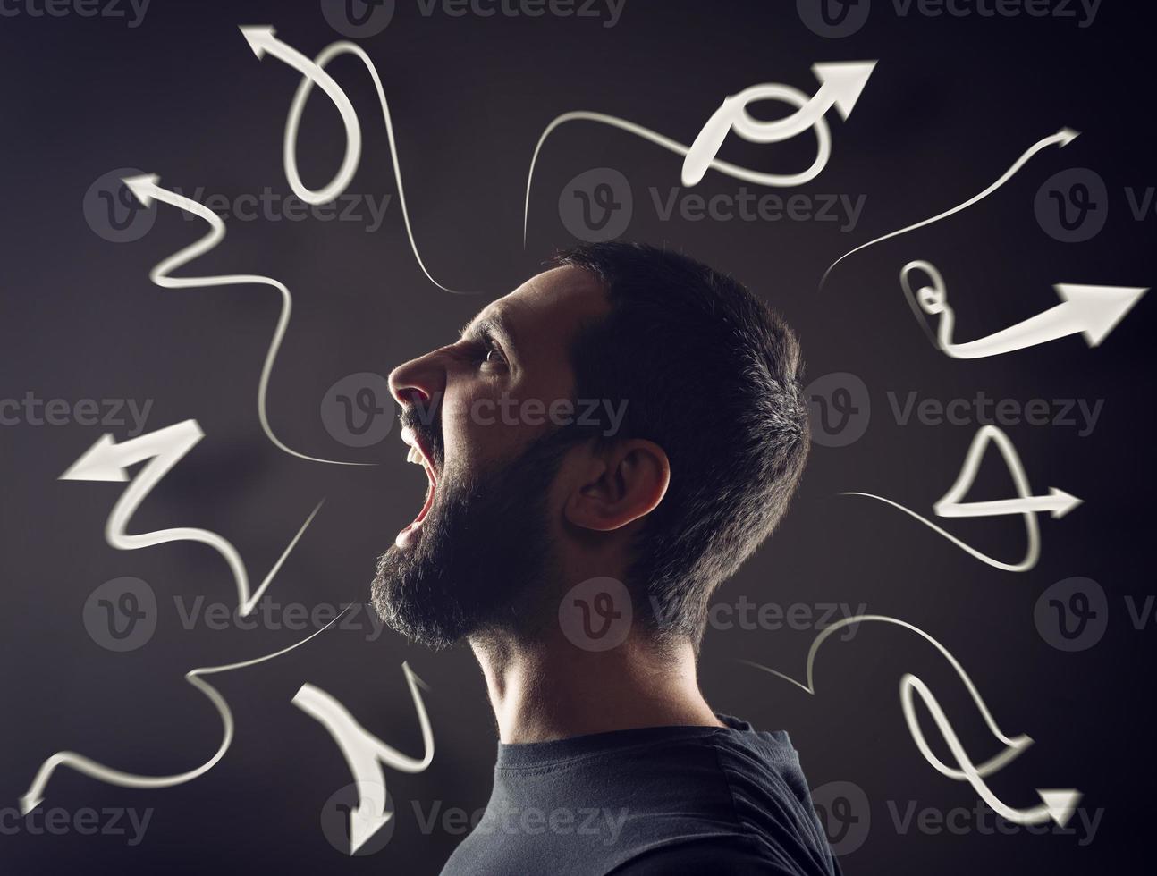 Man is stressed and screams due to confusion to find the right way photo