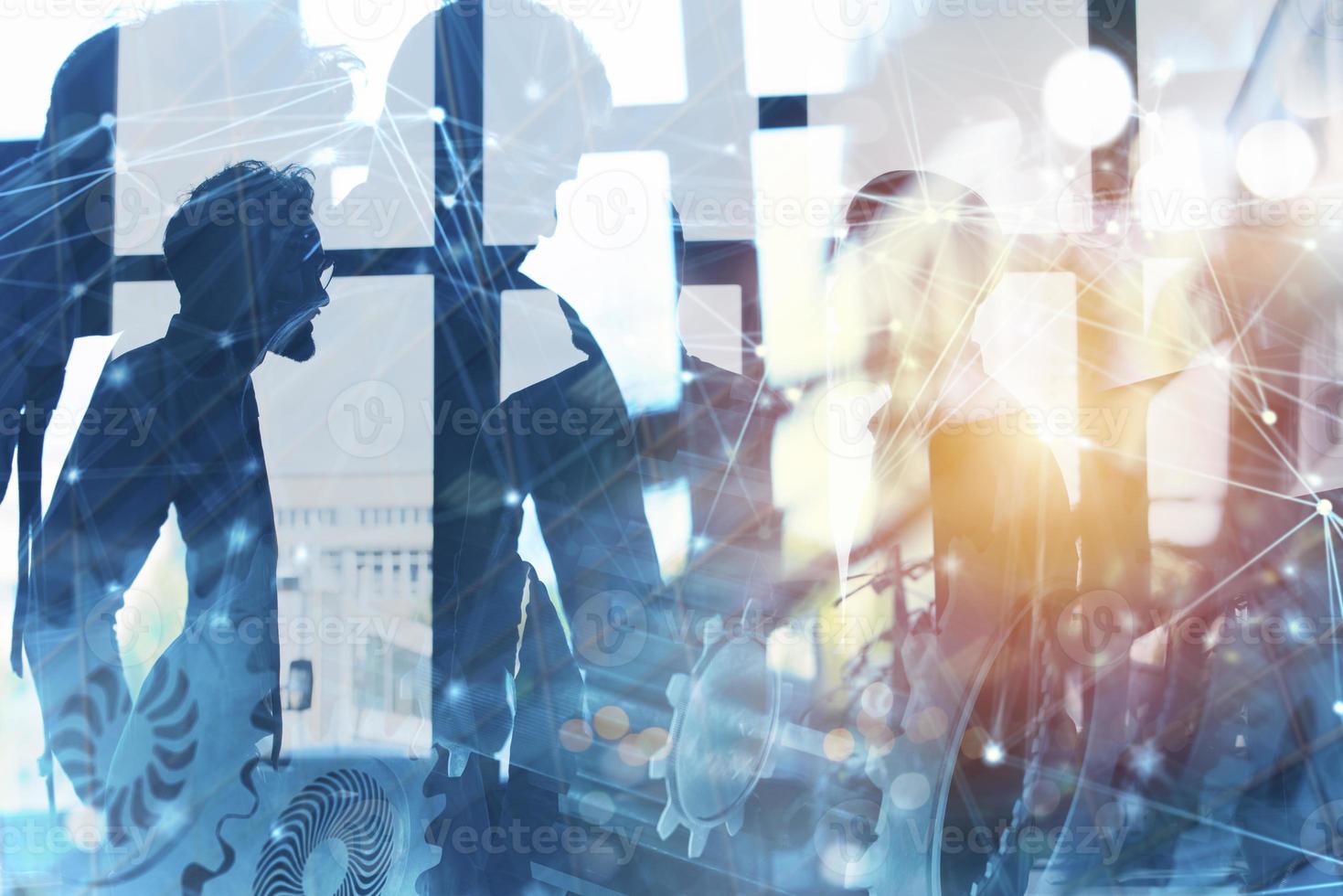 Business team with gears system. Teamwork, partnership and integration concept with network effect. double exposure photo