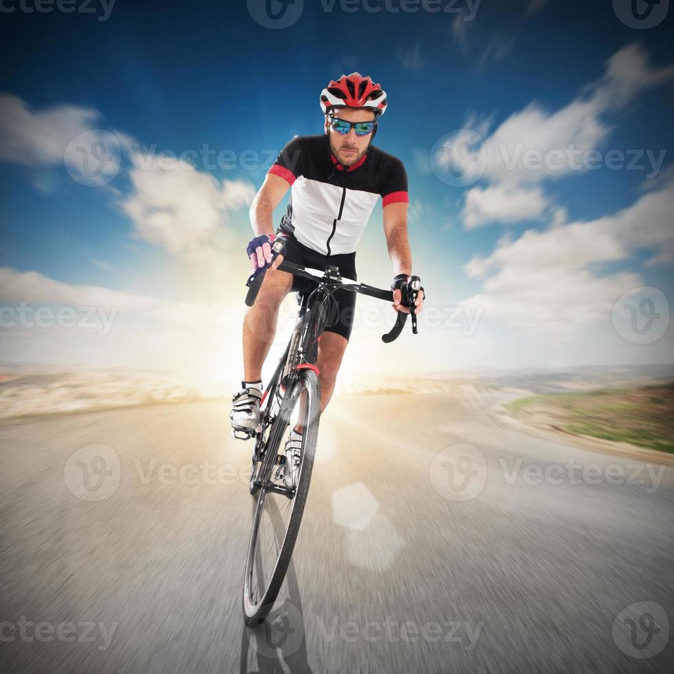 Cyclist on road photo