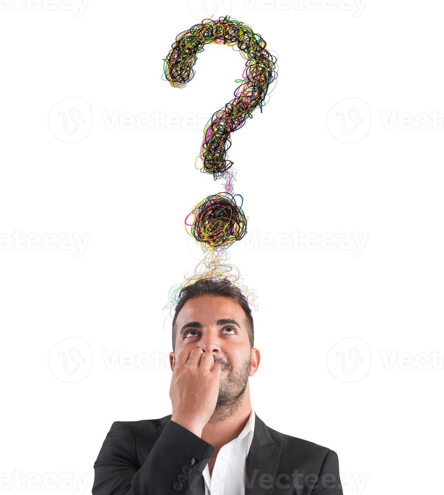 Businessman with big question photo