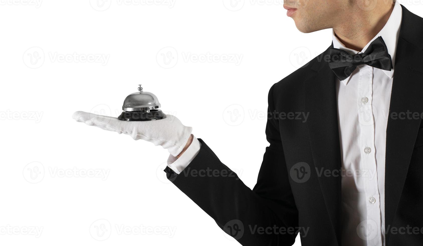 Waiter with bell in hand. Concept of first class service in your business photo