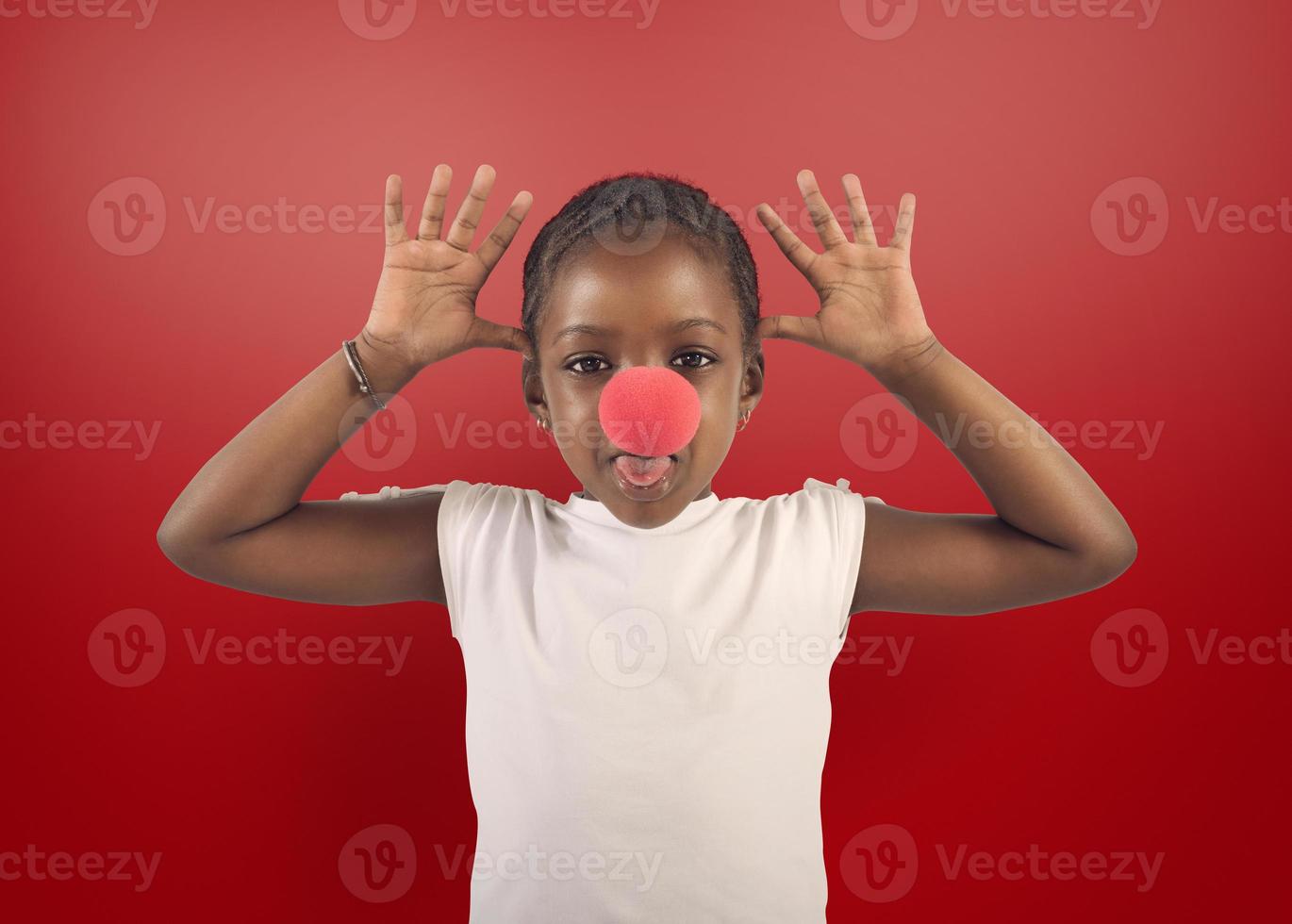 Little girl makes grimace with red noise photo