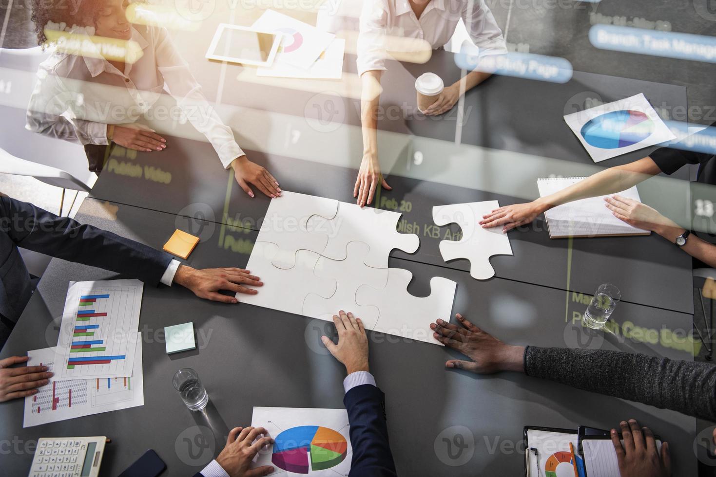 Teamwork of partners. Concept of integration and startup with puzzle pieces photo