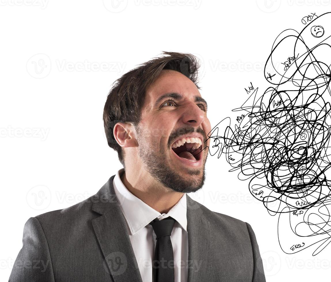 Stressed businessman screams photo