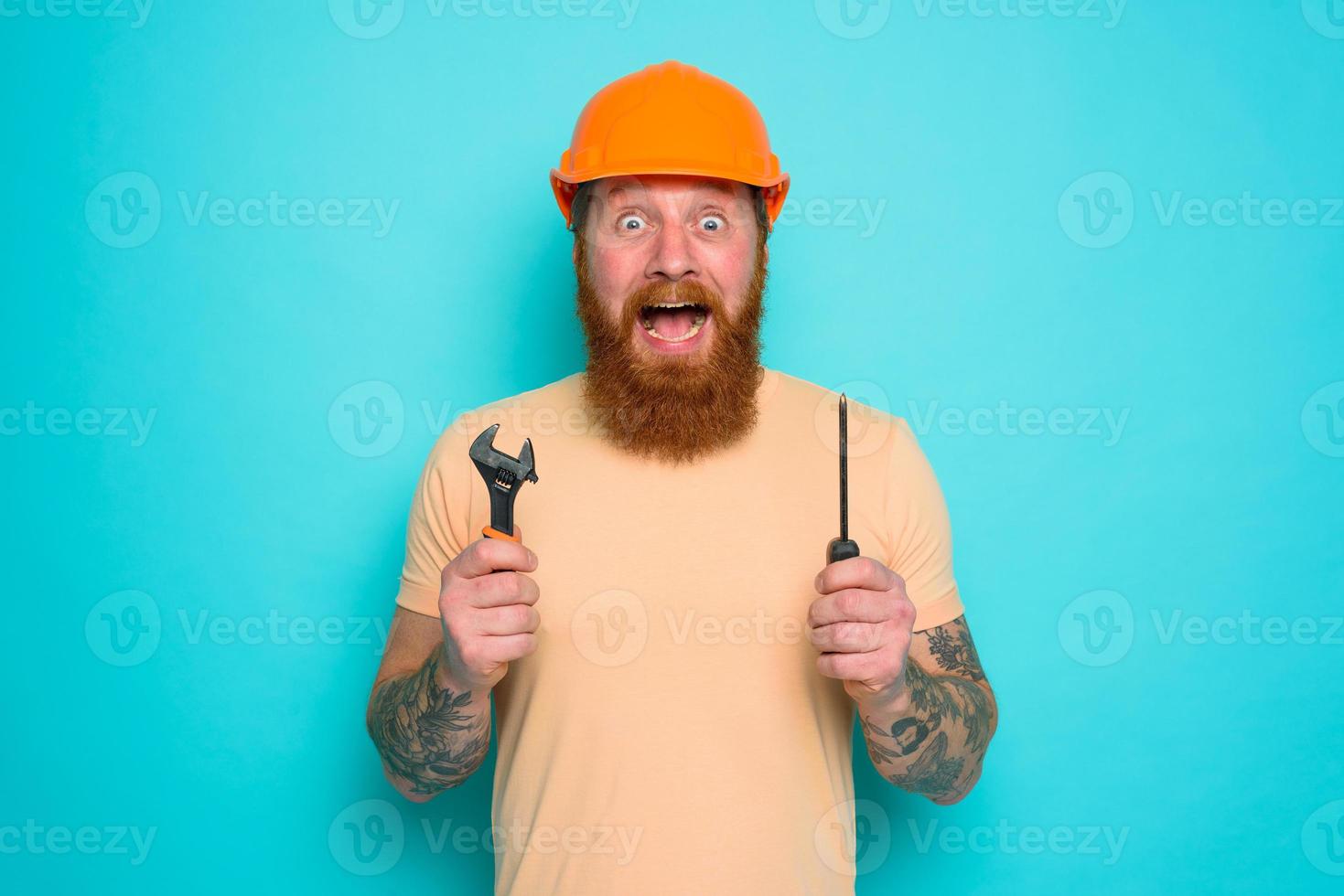 Incompetent worker is afraid and worried about his work photo