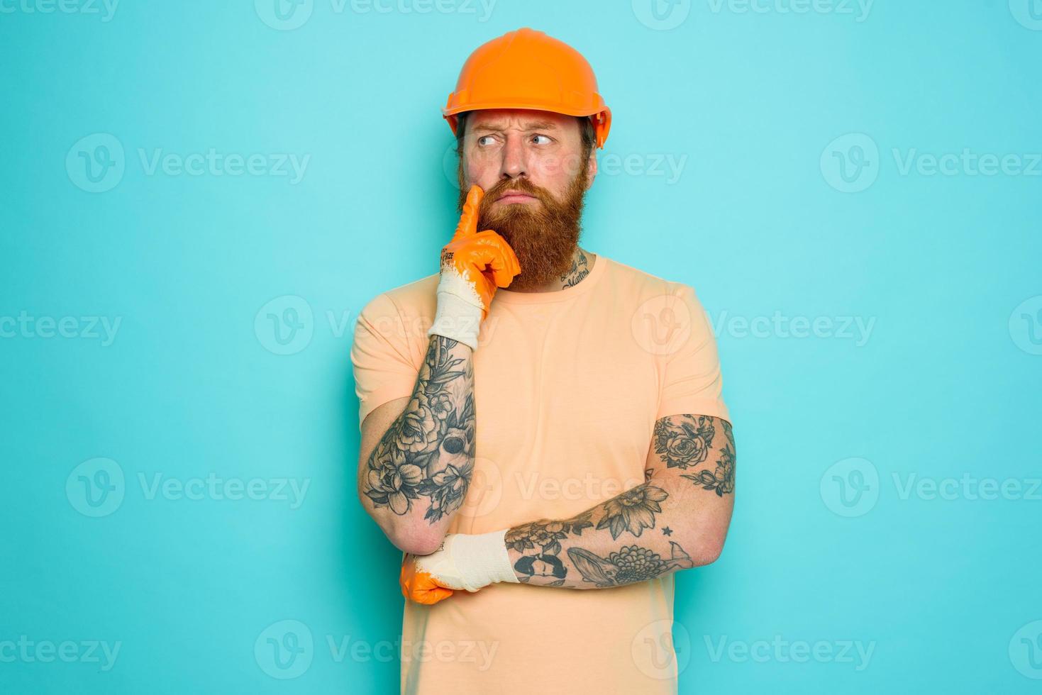 Incompetent worker is unsure and confused about his work photo