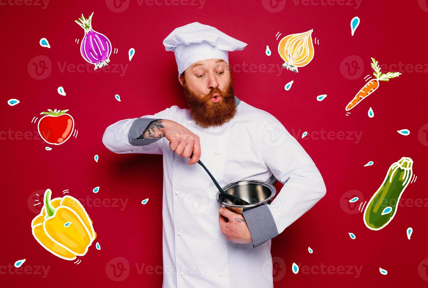 Chef is surprised about a new recipe. burgundy background photo