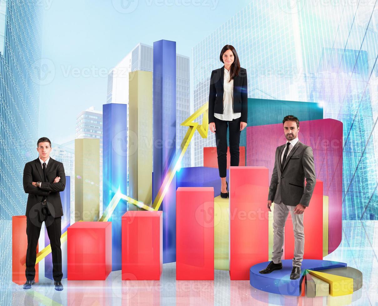 Business team on financial graphs and statistics photo