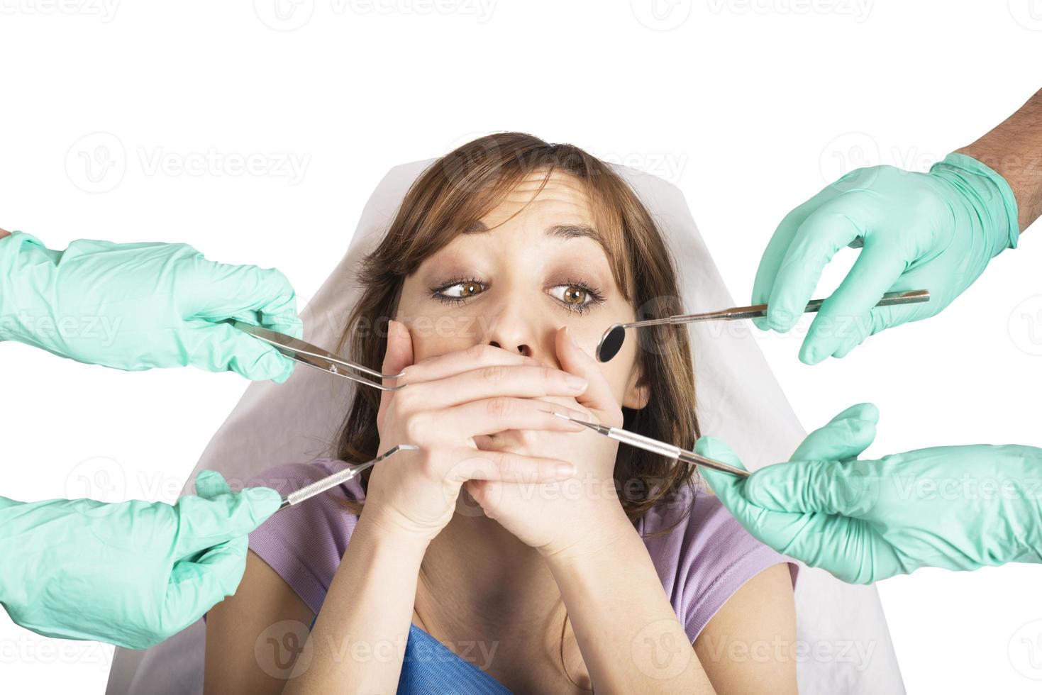 niña asustado por dentistas foto