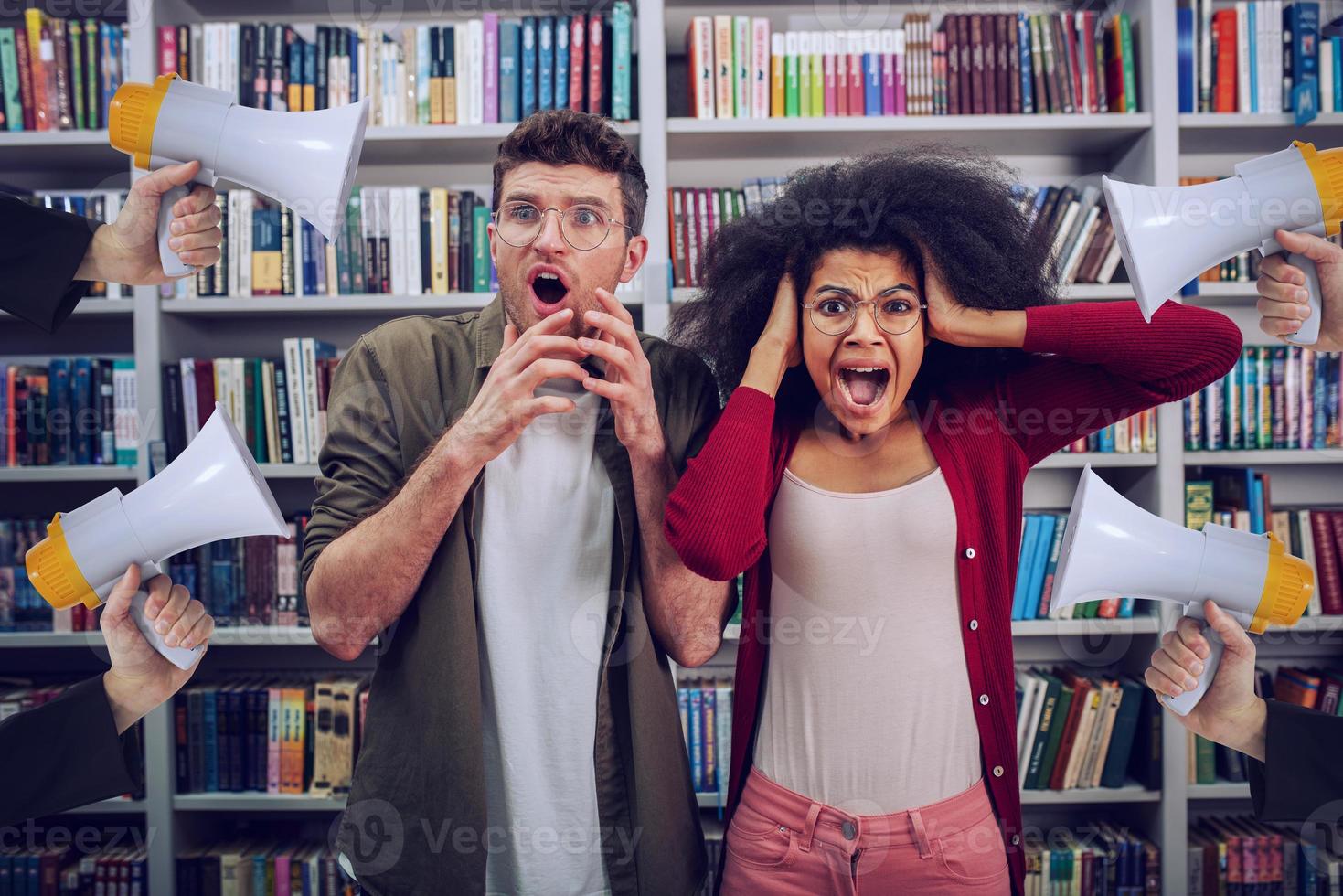 Student are worried and annoyed due to high volume of megaphone in a library photo